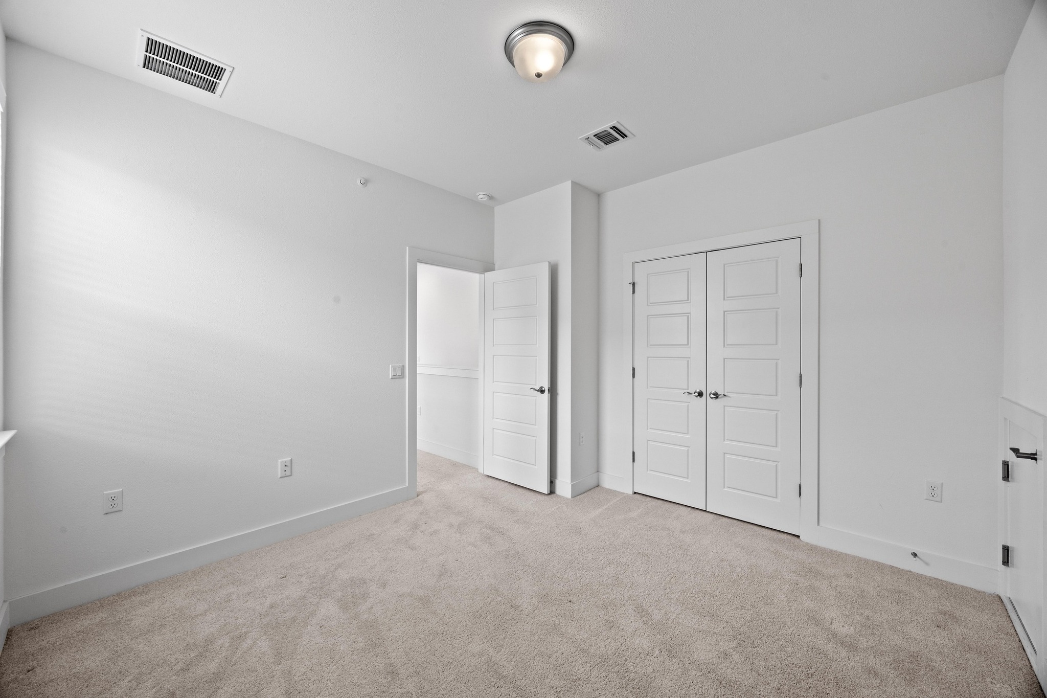 2222 Simond Avenue, Unit E Austin, TX 78723 - Photo 19 of 28 Upstairs secondary bedroom.