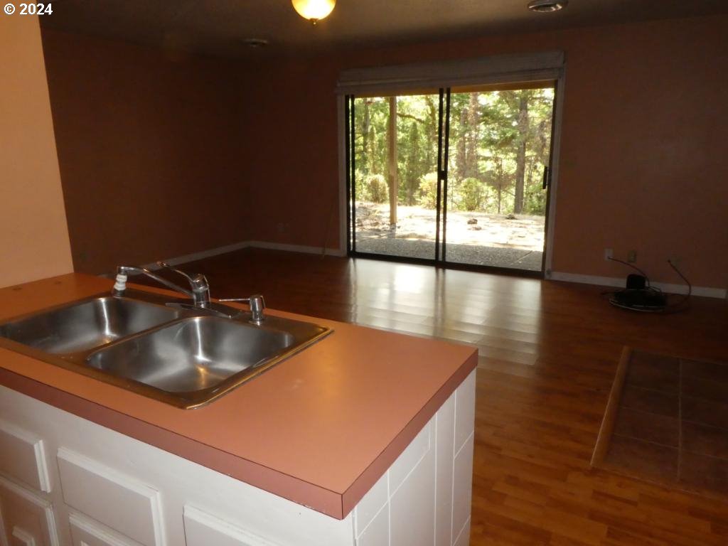 310 Southeast Terrace Drive Roseburg, OR 97470 - Photo 32 of 44 a kitchen with a sink and large window