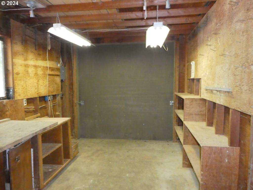 310 Southeast Terrace Drive Roseburg, OR 97470 - Photo 43 of 44 a bathroom with a granite countertop sink a large mirror and a shower