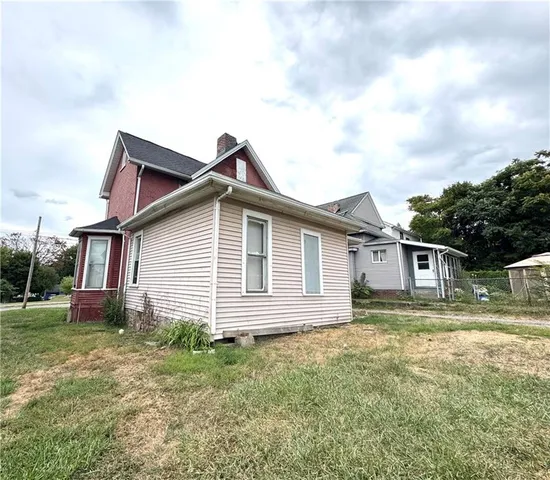 a backyard of a house with lots of green space