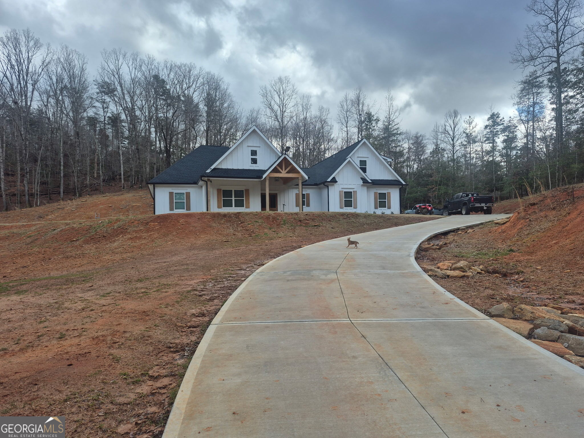 front view of a house with a yard