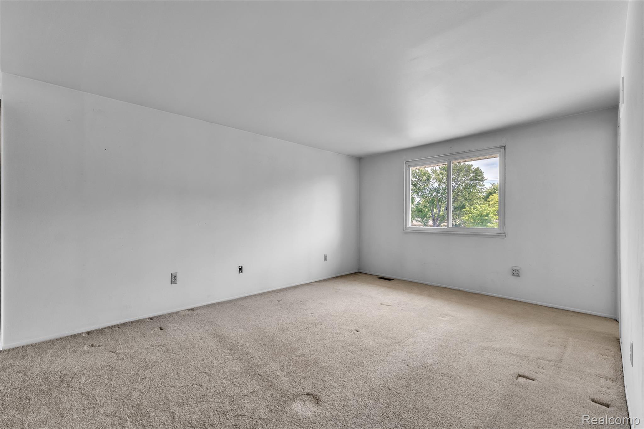 7000 Woonsocket Street Canton, MI 48187 - Photo 43 of 65 Spacious room featuring white painted walls and neutral carpeting