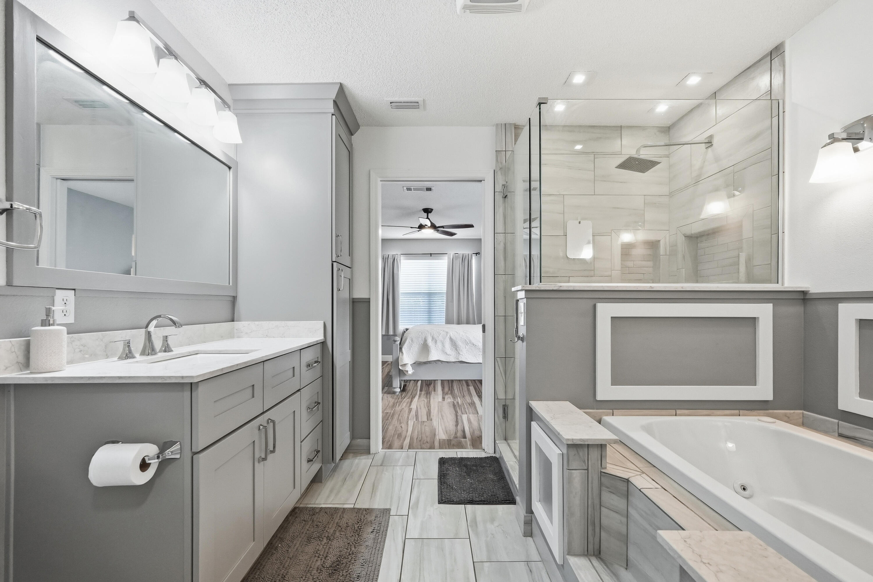 766 Randall Roberts Road Fort Walton Beach, FL 32547 - Photo 16 of 41 a bathroom with a tub sink and mirror