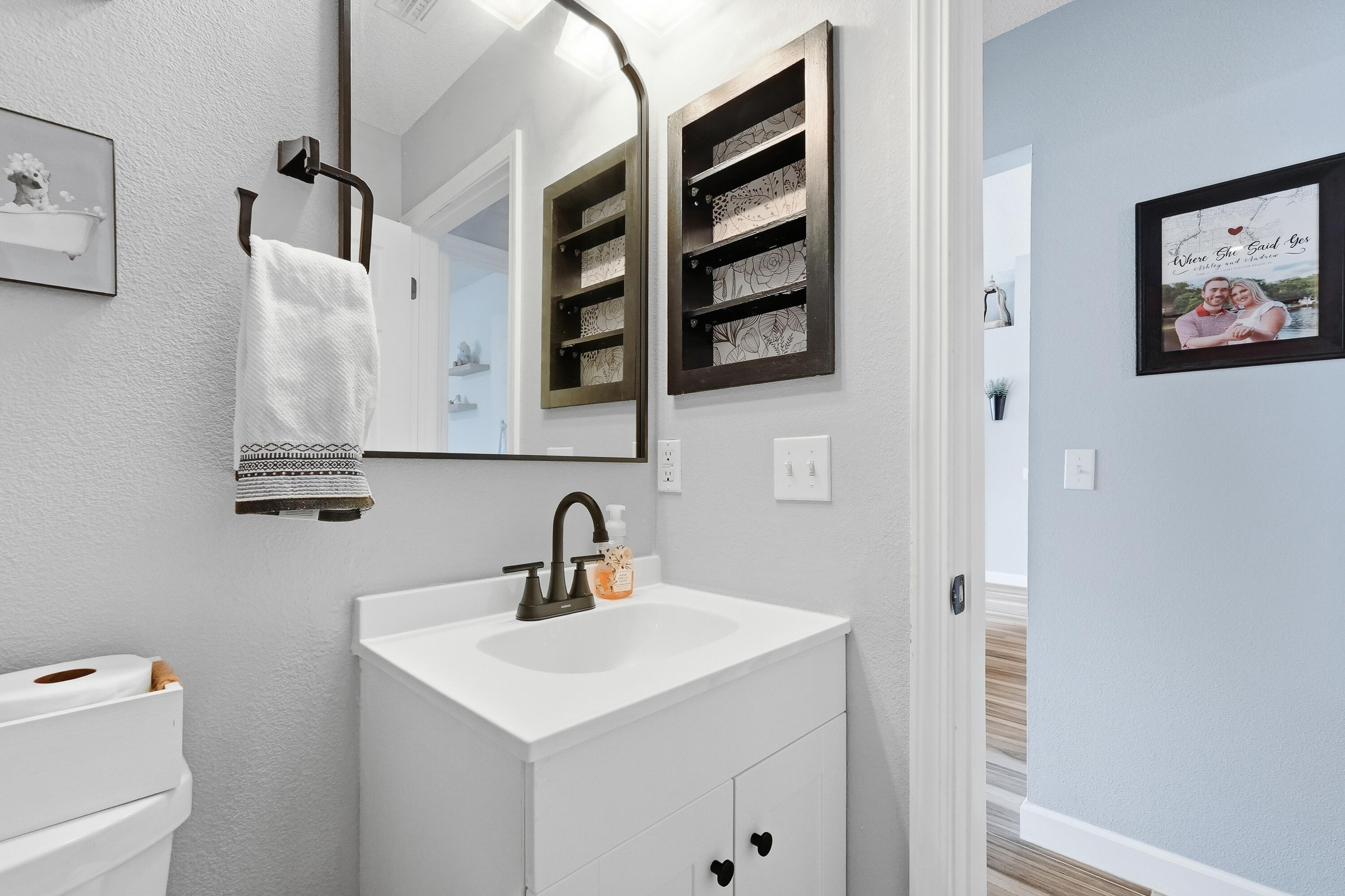 766 Randall Roberts Road Fort Walton Beach, FL 32547 - Photo 21 of 41 a bathroom with a sink and a mirror