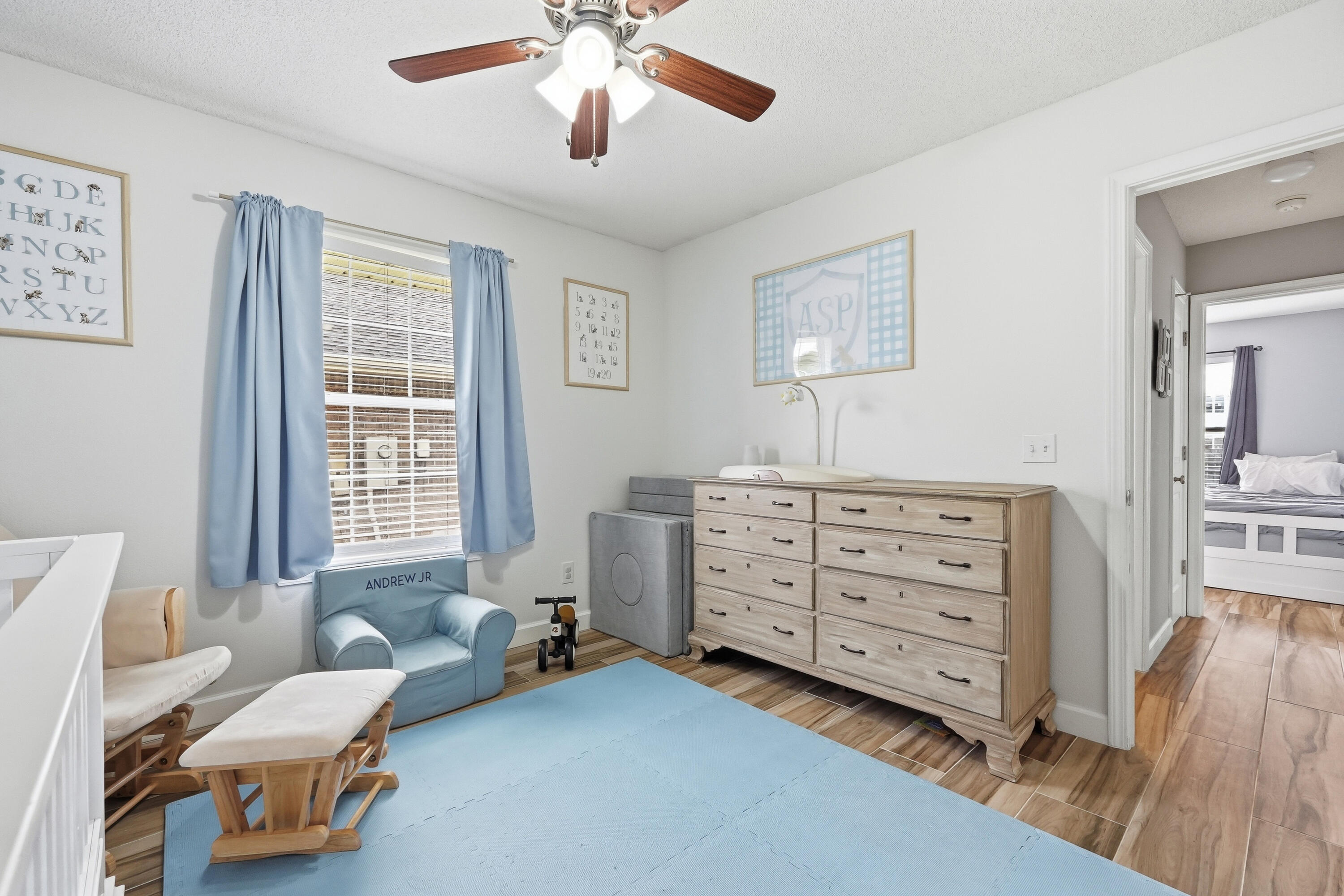 766 Randall Roberts Road Fort Walton Beach, FL 32547 - Photo 24 of 41 a bedroom with furniture and a window