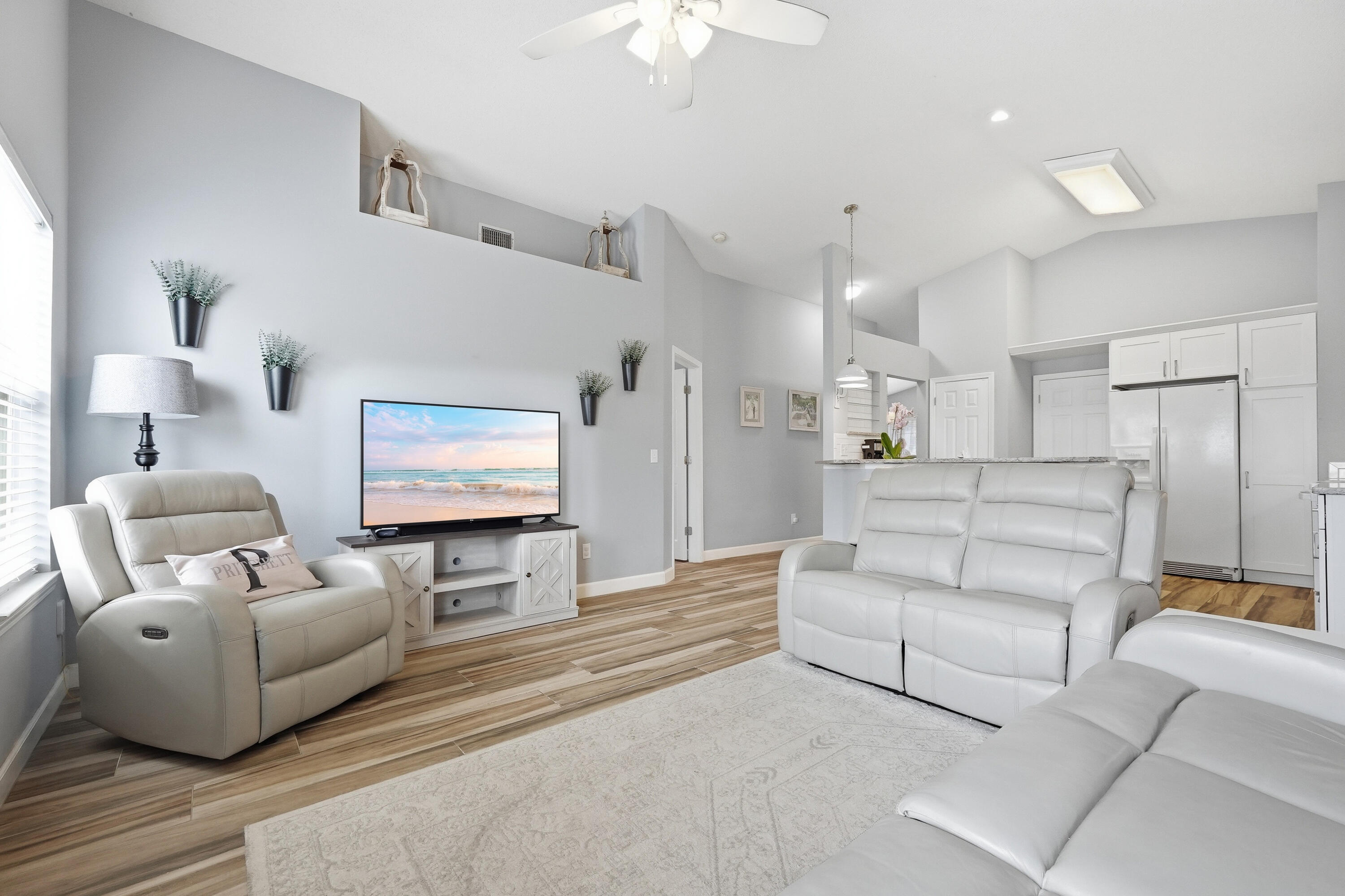 766 Randall Roberts Road Fort Walton Beach, FL 32547 - Photo 36 of 41 a living room with furniture and a flat screen tv