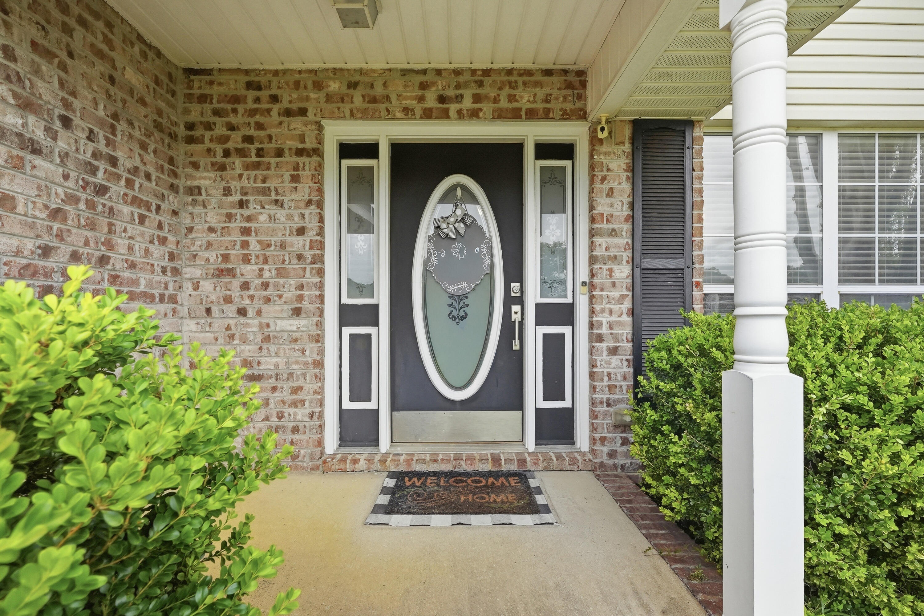 766 Randall Roberts Road Fort Walton Beach, FL 32547 - Photo 4 of 41 a front view of a house with garden