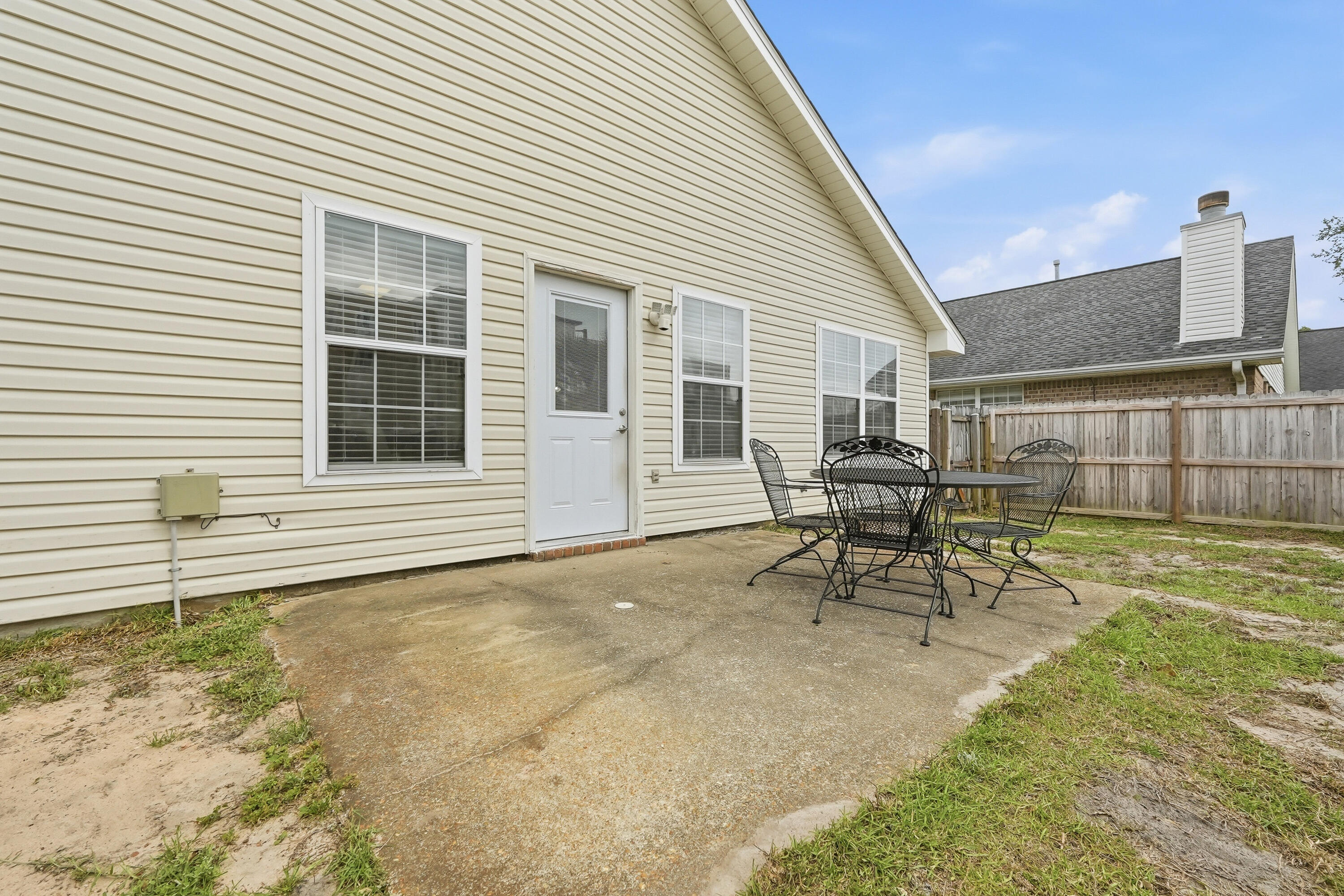 766 Randall Roberts Road Fort Walton Beach, FL 32547 - Photo 41 of 41 a view of a house with backyard and sitting area