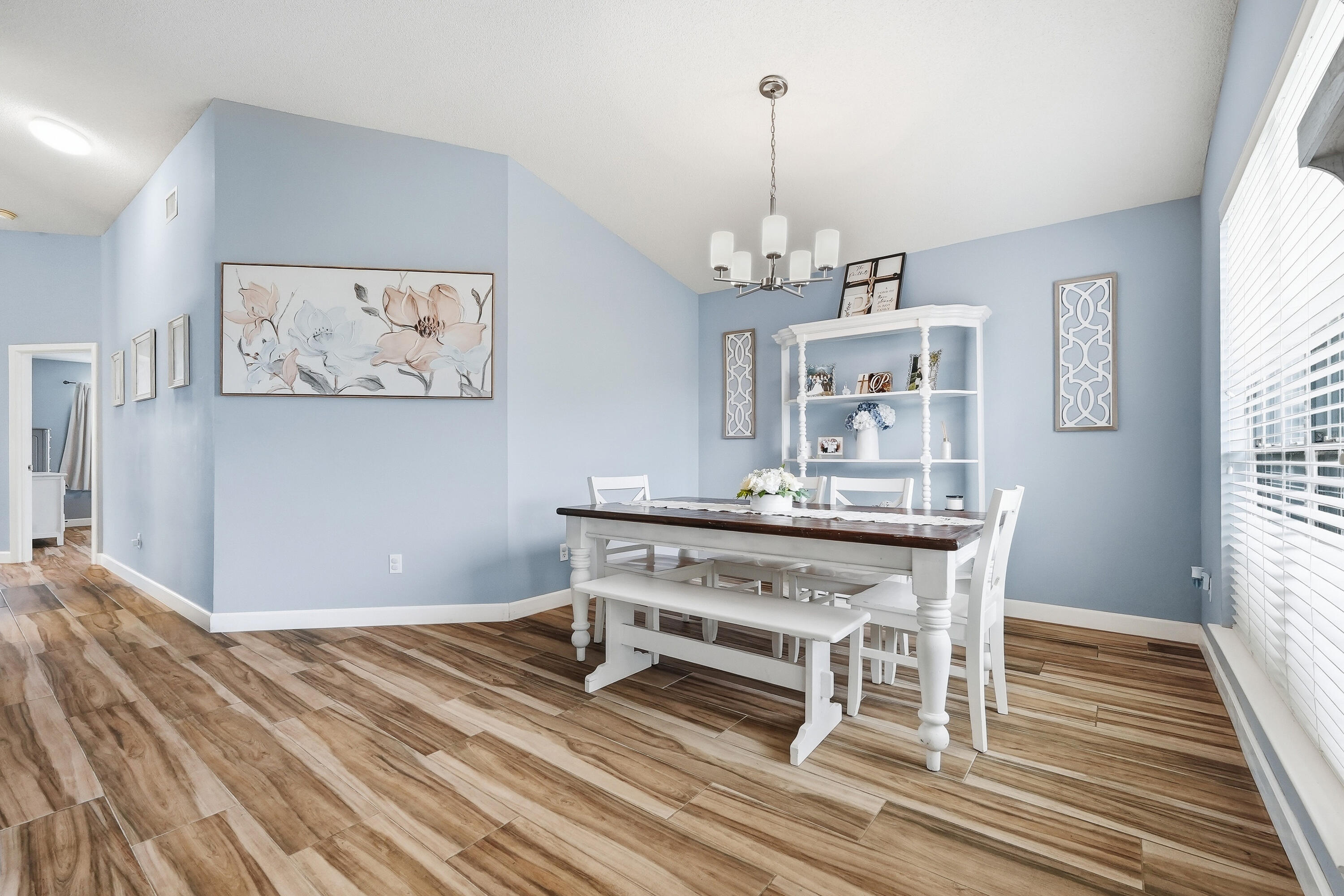 766 Randall Roberts Road Fort Walton Beach, FL 32547 - Photo 5 of 41 a view of a dining room with furniture and wooden floor
