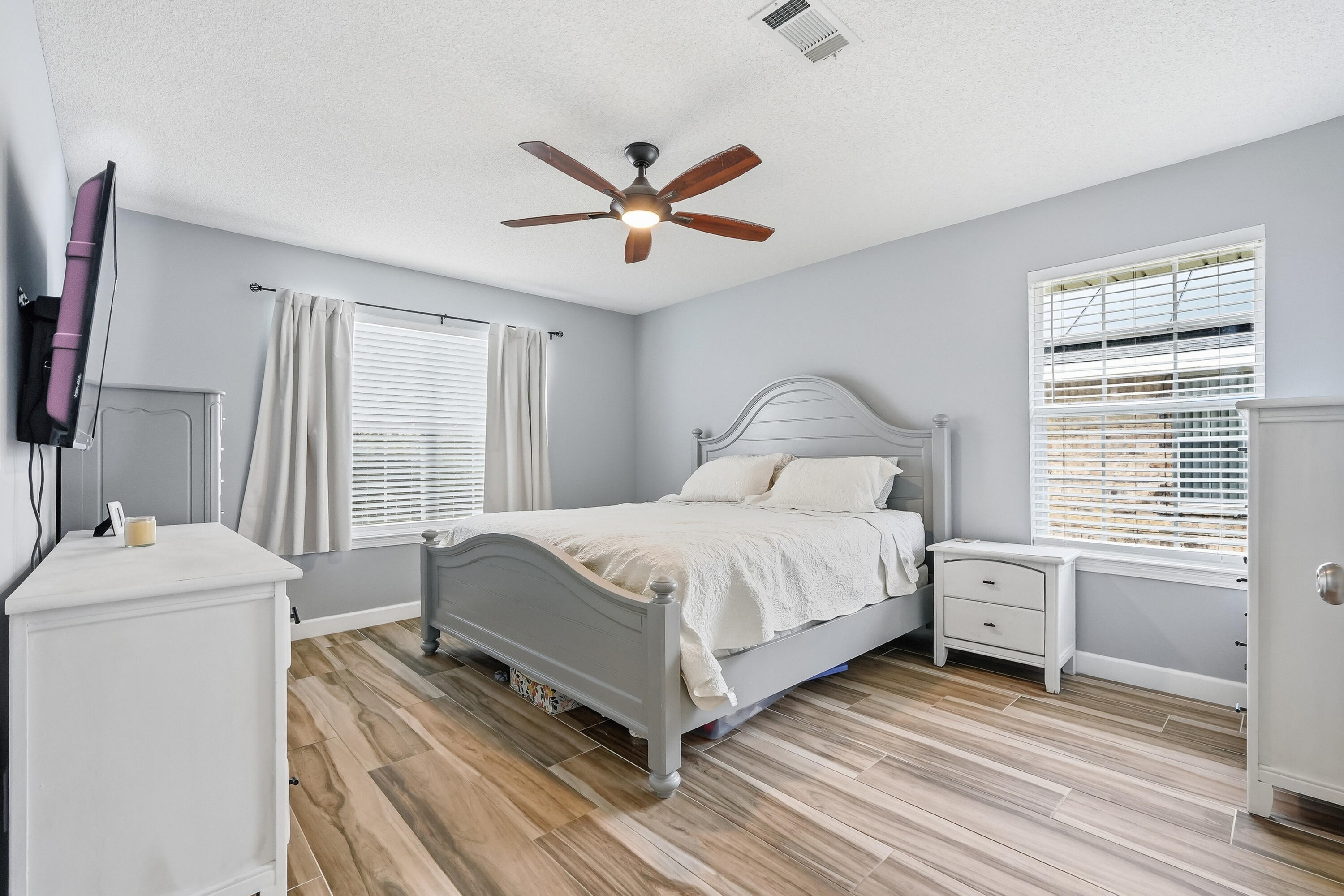 766 Randall Roberts Road Fort Walton Beach, FL 32547 - Photo 8 of 41 a bedroom with a bed and a window