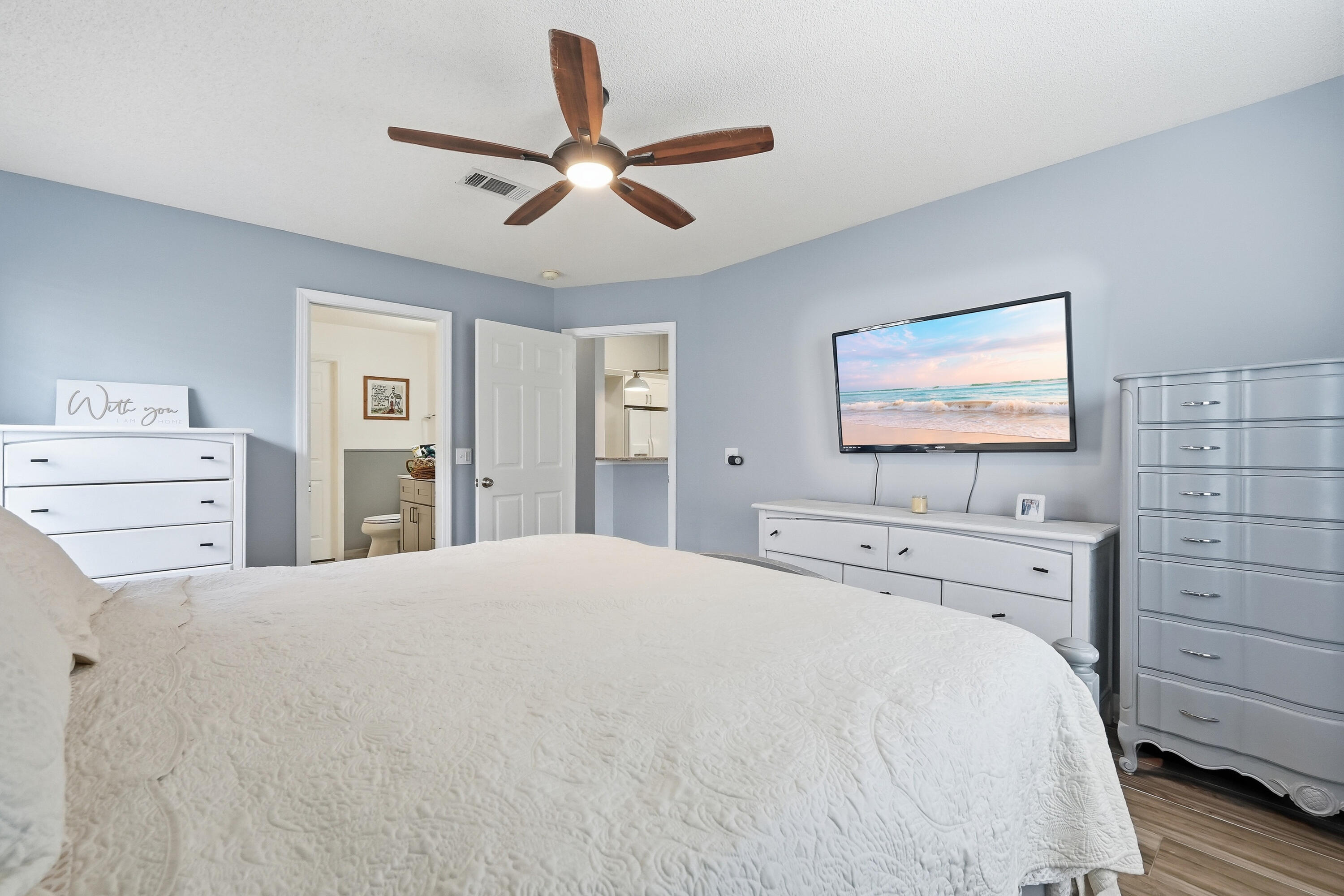 766 Randall Roberts Road Fort Walton Beach, FL 32547 - Photo 9 of 41 a bedroom with a bed and a flat screen tv