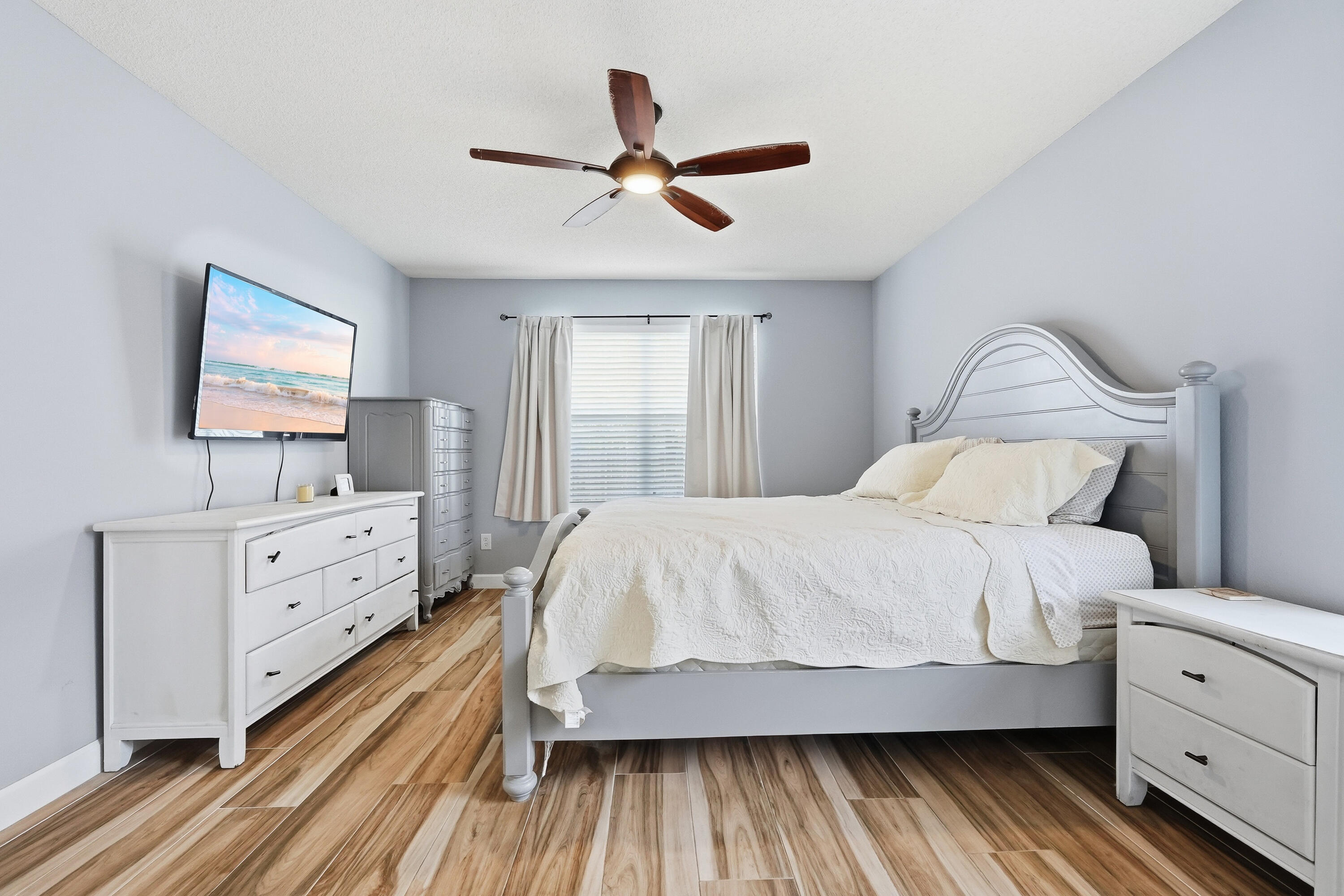 766 Randall Roberts Road Fort Walton Beach, FL 32547 - Photo 10 of 41 a spacious bedroom with a bed and a dresser