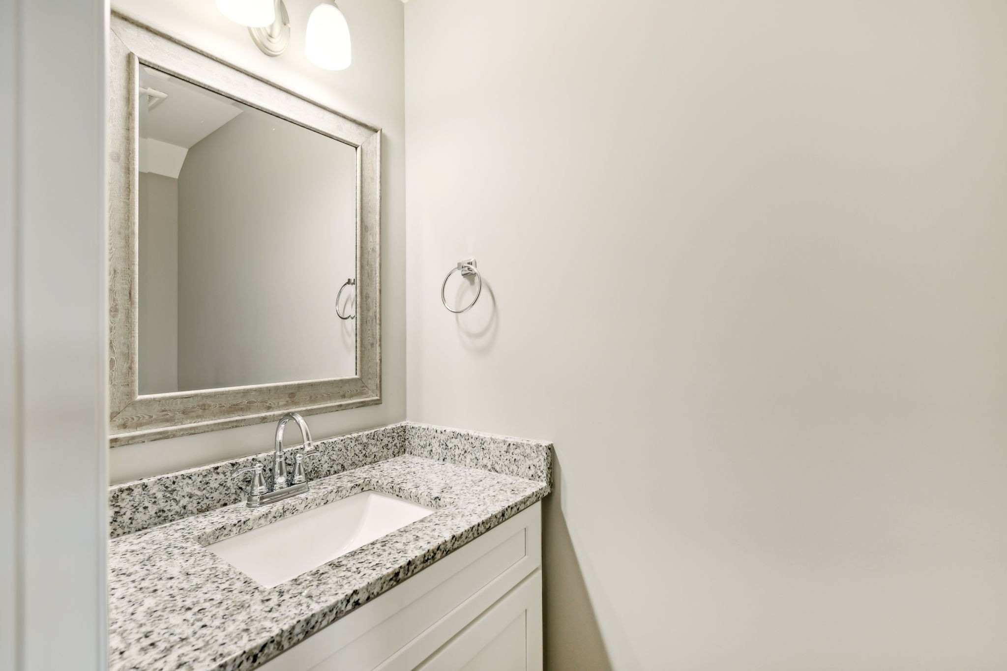 927 Sutton Cove Columbia, TN 38401 - Photo 17 of 24 a bathroom with a granite countertop sink and a mirror