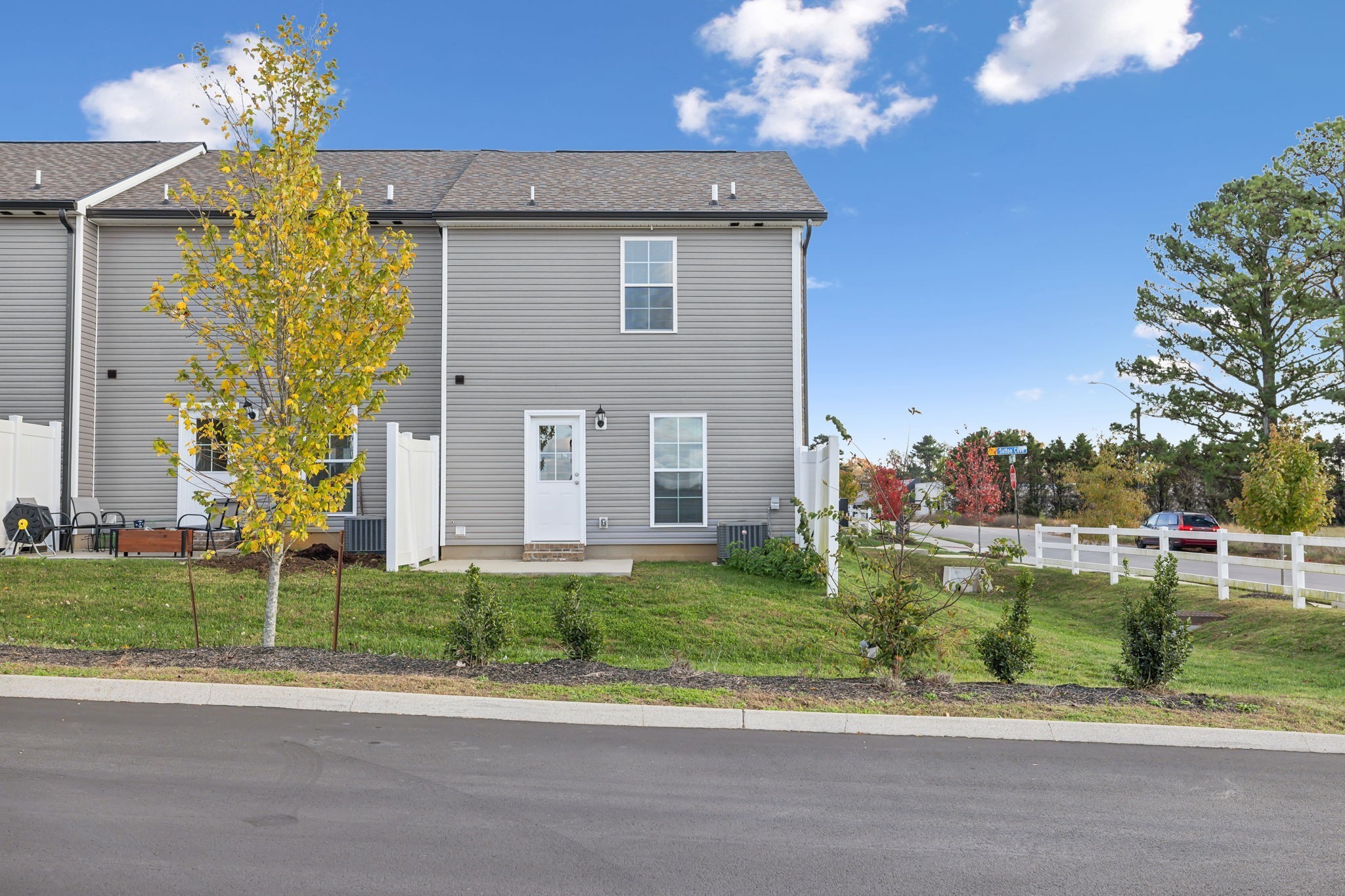 927 Sutton Cove Columbia, TN 38401 - Photo 2 of 24 a front view of a house with a yard and potted plants