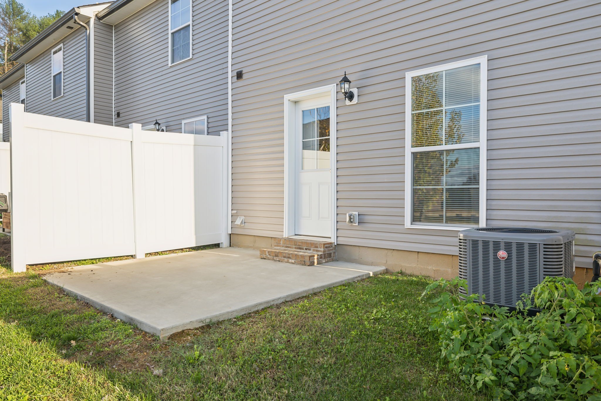 927 Sutton Cove Columbia, TN 38401 - Photo 23 of 24 a view of an house with backyard and a tree