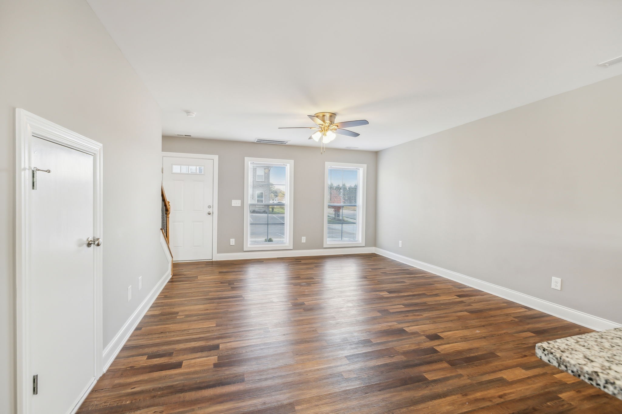 927 Sutton Cove Columbia, TN 38401 - Photo 8 of 24 a view of an empty room with wooden floor and a window