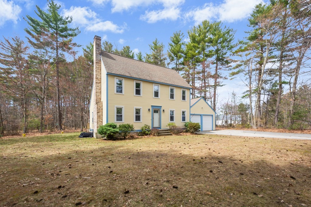 148 Walker Road Shirley, MA 01464 - Photo 1 of 35 a front view of a house with a yard