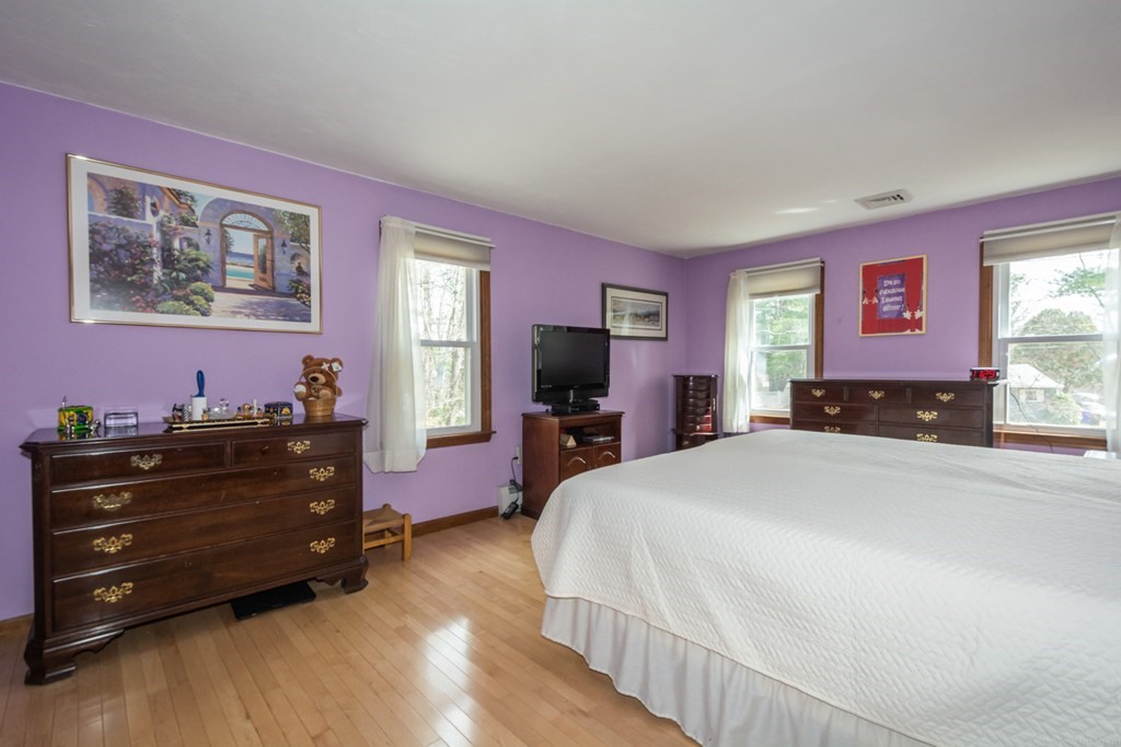 148 Walker Road Shirley, MA 01464 - Photo 16 of 35 a bed room with a bed and a television