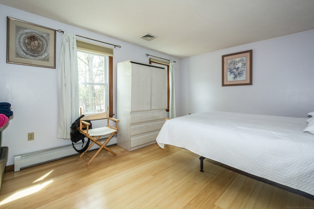 148 Walker Road Shirley, MA 01464 - Photo 20 of 35 a bedroom with a bed and a window