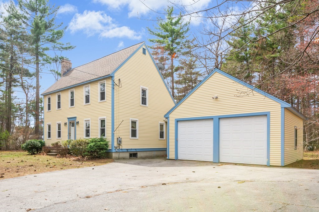 148 Walker Road Shirley, MA 01464 - Photo 2 of 35 a view of a house with a yard