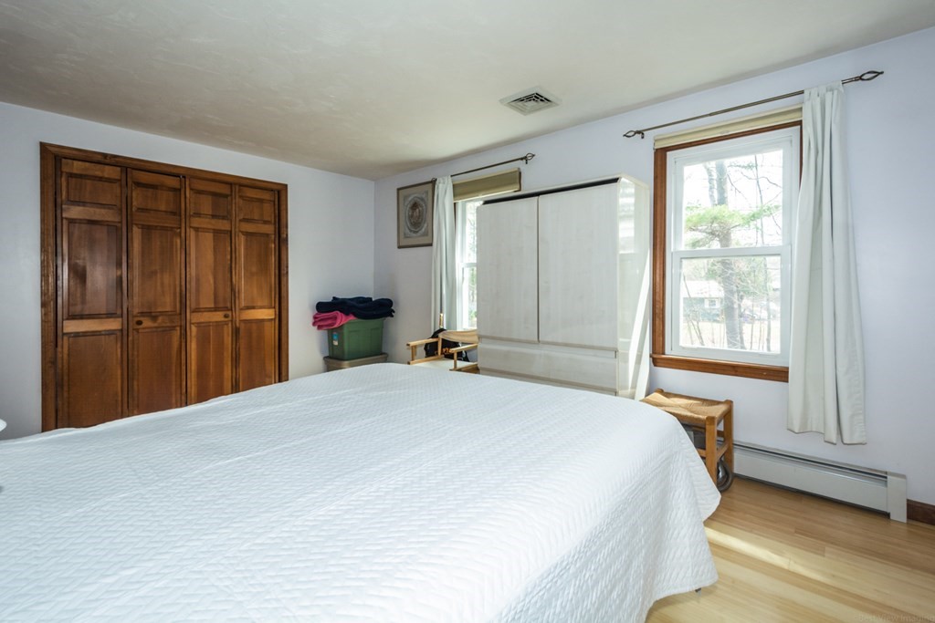 148 Walker Road Shirley, MA 01464 - Photo 22 of 35 a bedroom with a bed and a window