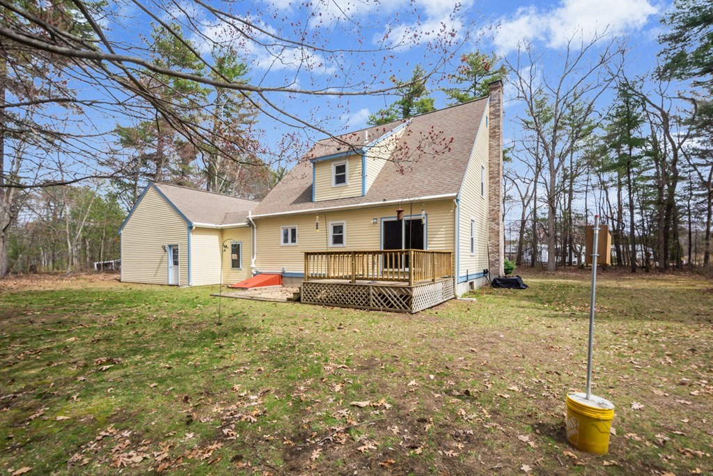148 Walker Road Shirley, MA 01464 - Photo 31 of 35 a view of a white house with a yard