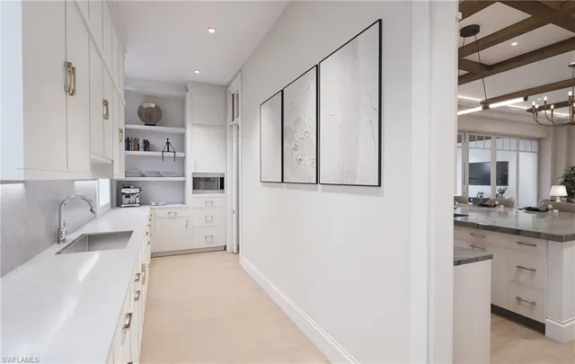 a view of living room with furniture and window