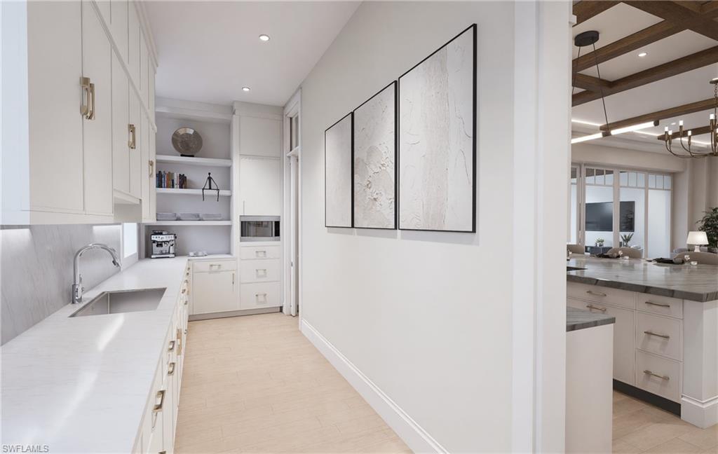 408 16th Avenue South Naples, FL 34102 - Photo 11 of 25 a view of living room with furniture and window
