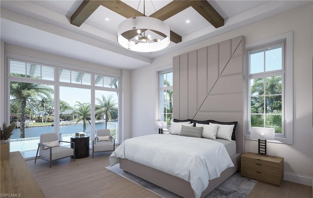 408 16th Avenue South Naples, FL 34102 - Photo 13 of 25 a bedroom with a bed and a large window