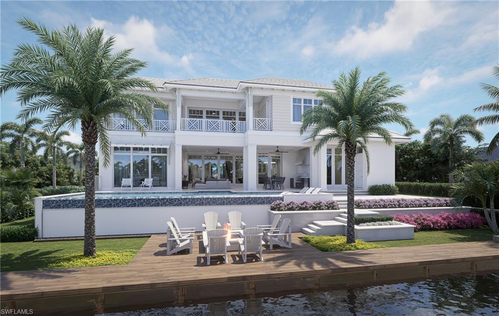 408 16th Avenue South Naples, FL 34102 - Photo 22 of 25 a front view of a house with garden