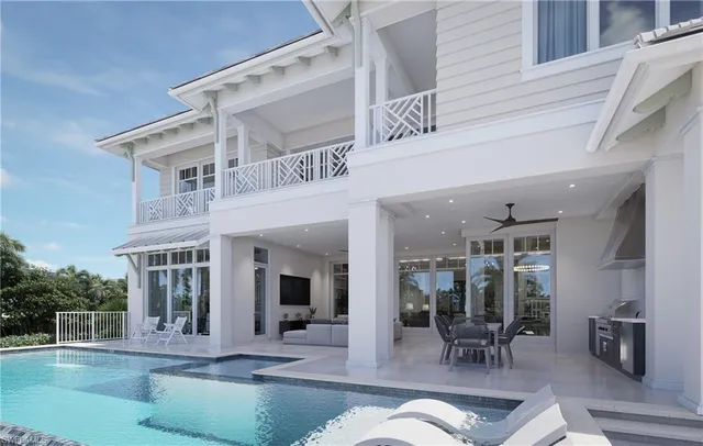 a view of living room kitchen with furniture and large window