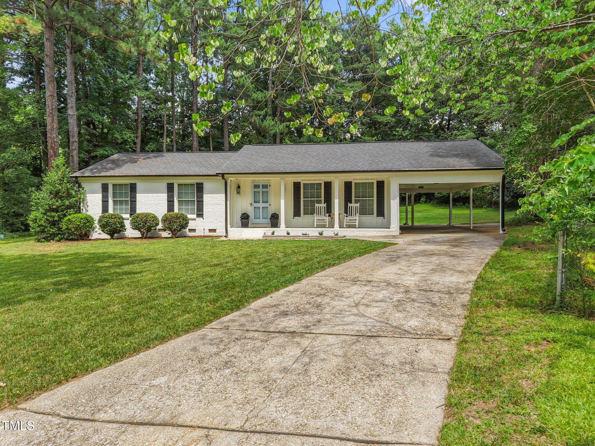 404 Troy Place Raleigh, NC 27609 - Photo 1 of 25 4-web-or-mls-DJI_20250624143752_0005_D