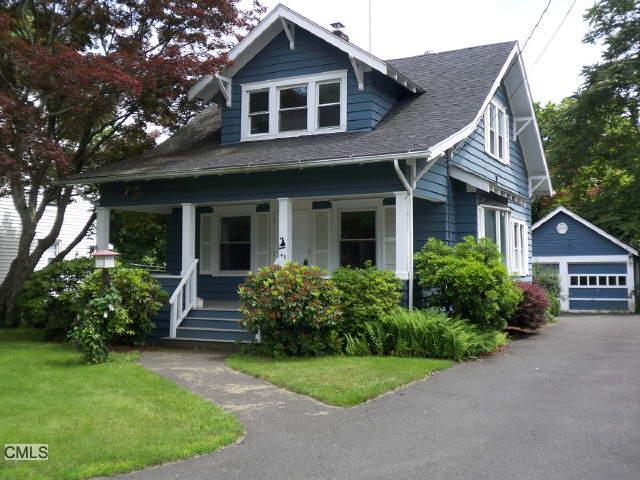 48 John Street Trumbull, CT 06611 - Photo 1 of 1 a front view of a house with garden