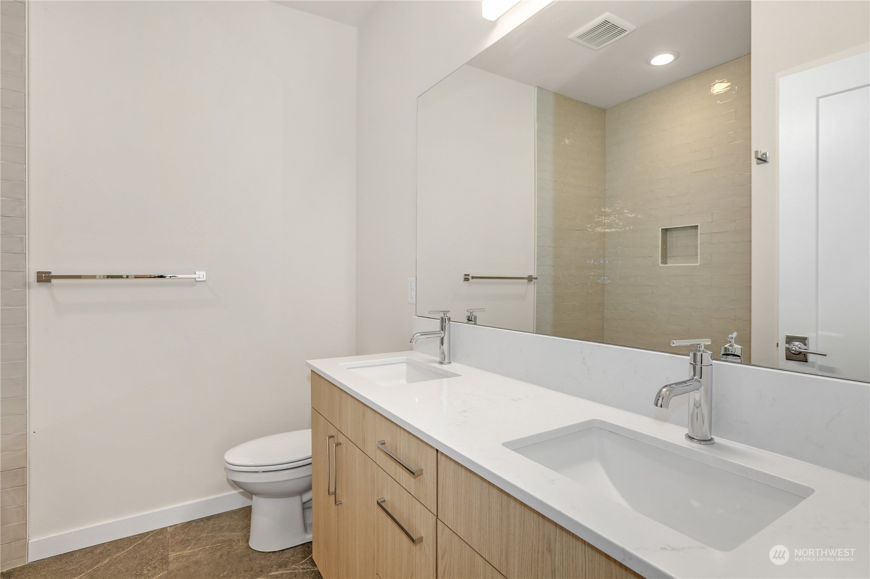 14493 Cedar Grove Road Southeast, Unit D102 Issaquah, WA 98027 - Photo 18 of 23 a bathroom with a sink toilet and vanity