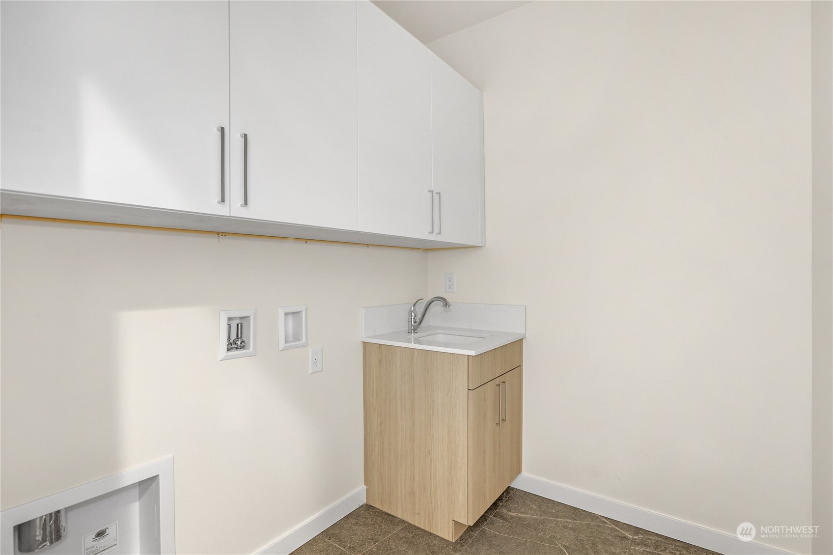 14493 Cedar Grove Road Southeast, Unit D102 Issaquah, WA 98027 - Photo 19 of 23 a bathroom with a sink and cabinets