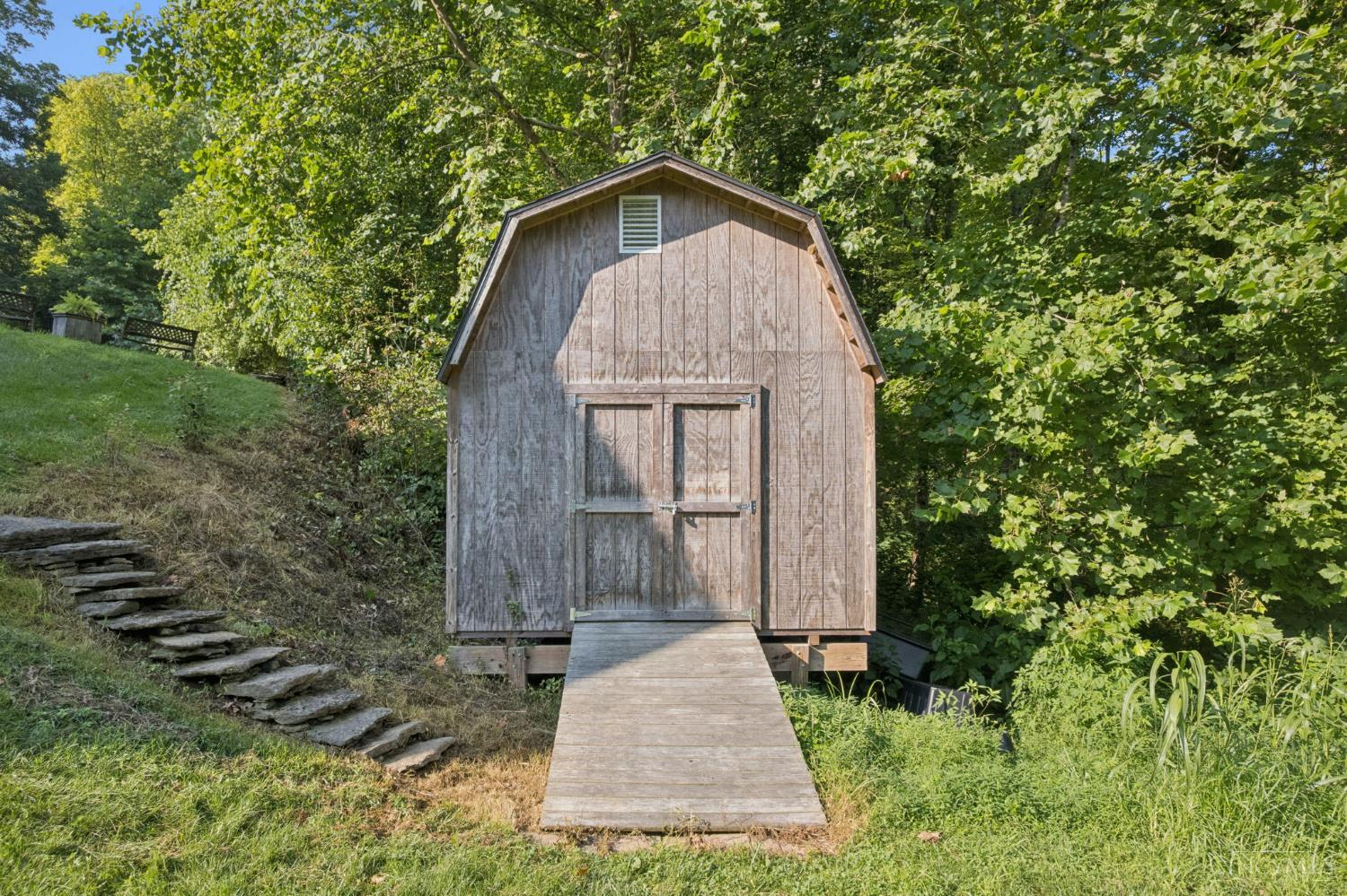 6050 Dry Ridge Road Cincinnati, OH 45252 - Photo 11 of 57 Pathway from garage area leads to this storage barn w/loft.
