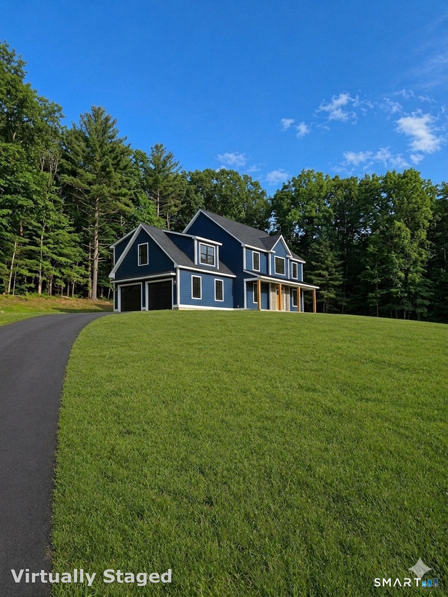 106 South Street Extension Coventry, CT 06238 - Photo 1 of 33 a view of a house with a yard