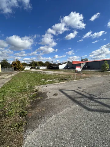 a view of a yard with an outdoor space