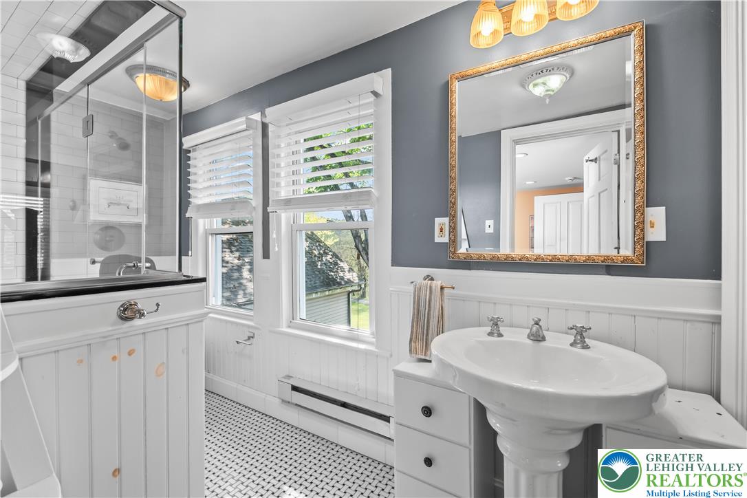1072 5 Points Richmond Road Bangor, PA 18013 - Photo 48 of 66 a bathroom with a sink and a mirror