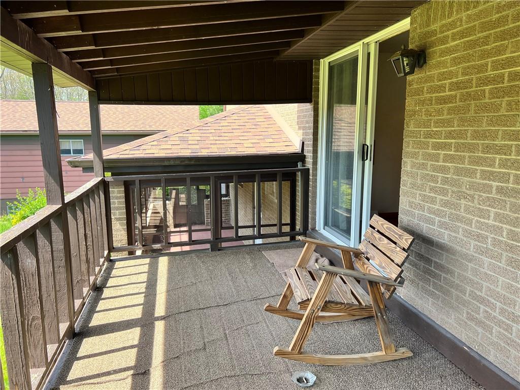 880 Pizza Barn Road Blairsville, PA 15717 - Photo 12 of 44 a view of a porch with chairs and couches
