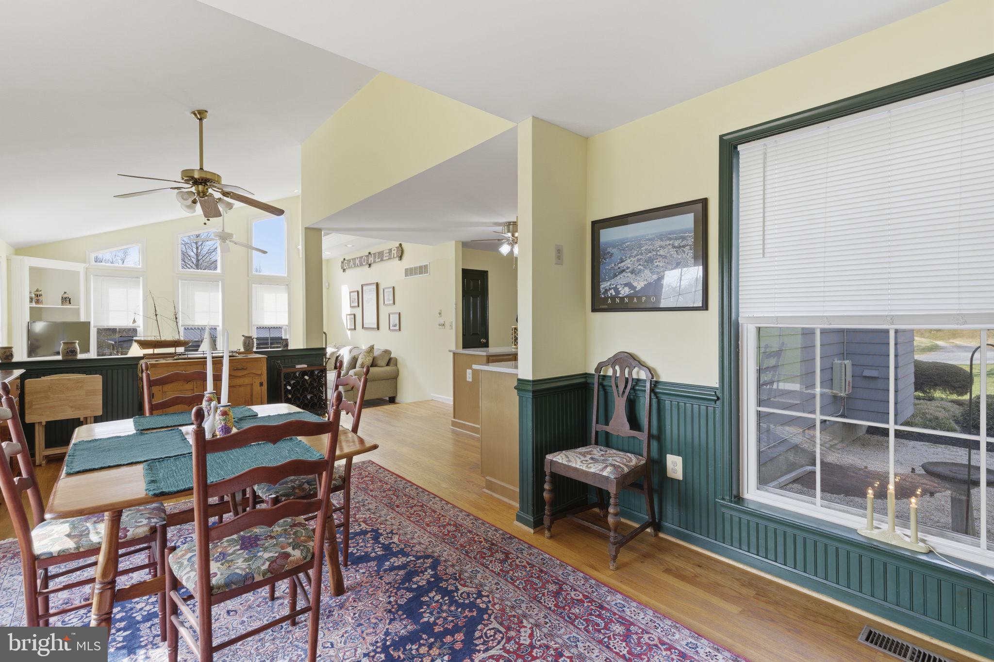 3831 Wilkinson Road Havre de Grace, MD 21078 - Photo 16 of 51 a living room with furniture and a floor to ceiling window