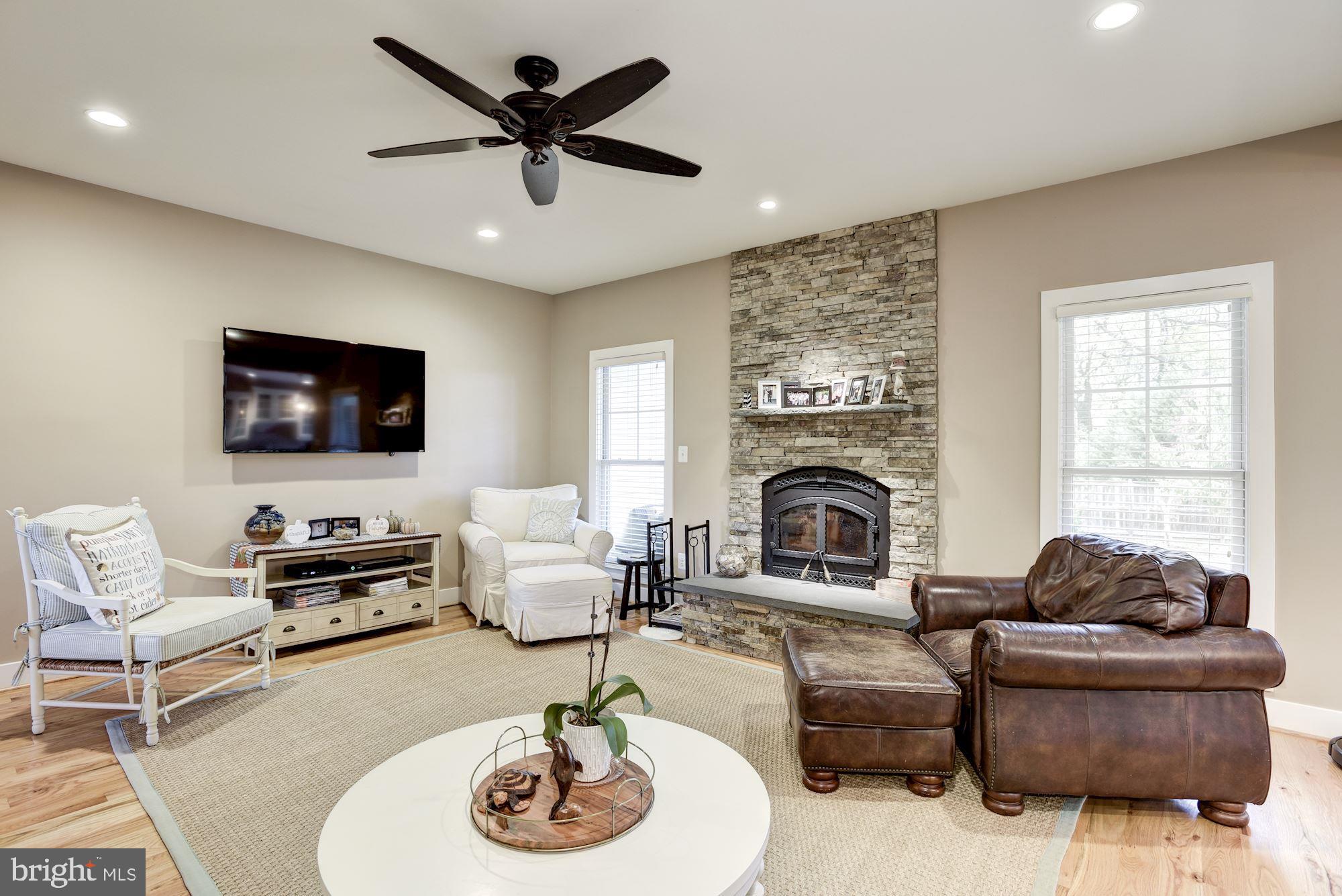 17233 Ivandale Road Hamilton, VA 20158 - Photo 22 of 62 WOODBURNING FIREPLACE WITH WROUGHT IRON DOORS