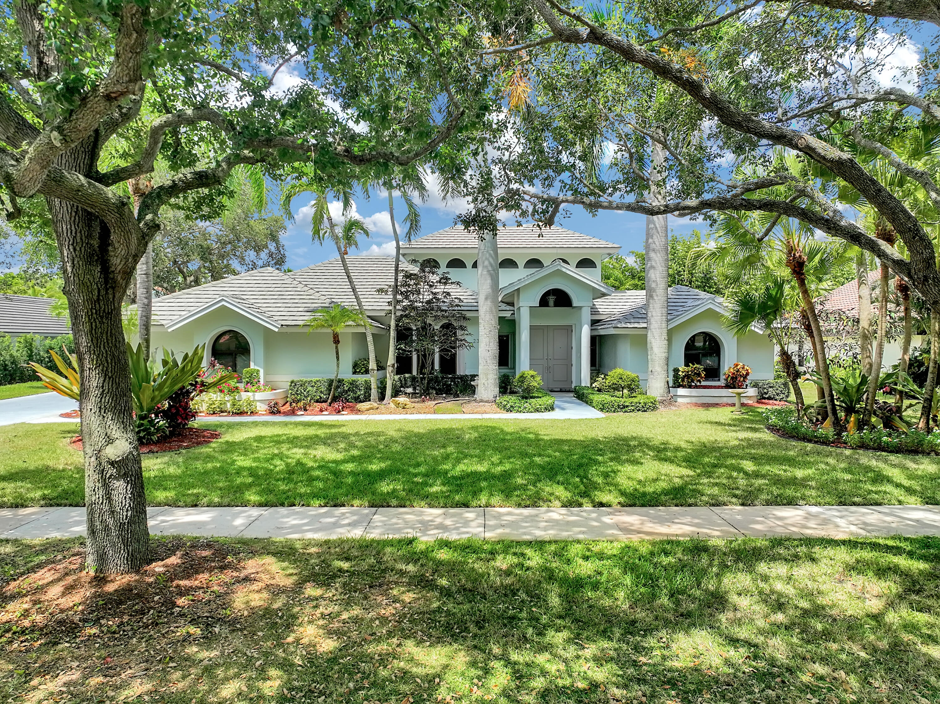 2310 Rabbit Hollowe Circle Delray Beach, FL 33445 - Photo 1 of 47 Front