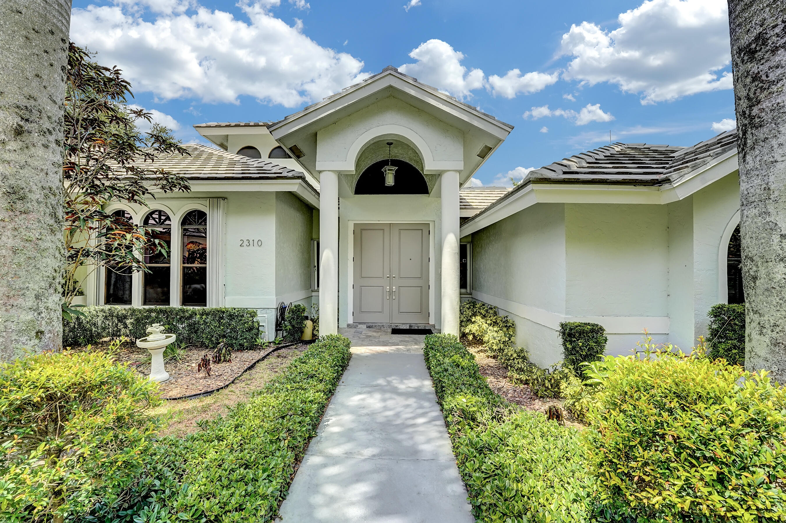 2310 Rabbit Hollowe Circle Delray Beach, FL 33445 - Photo 11 of 47 Entrance