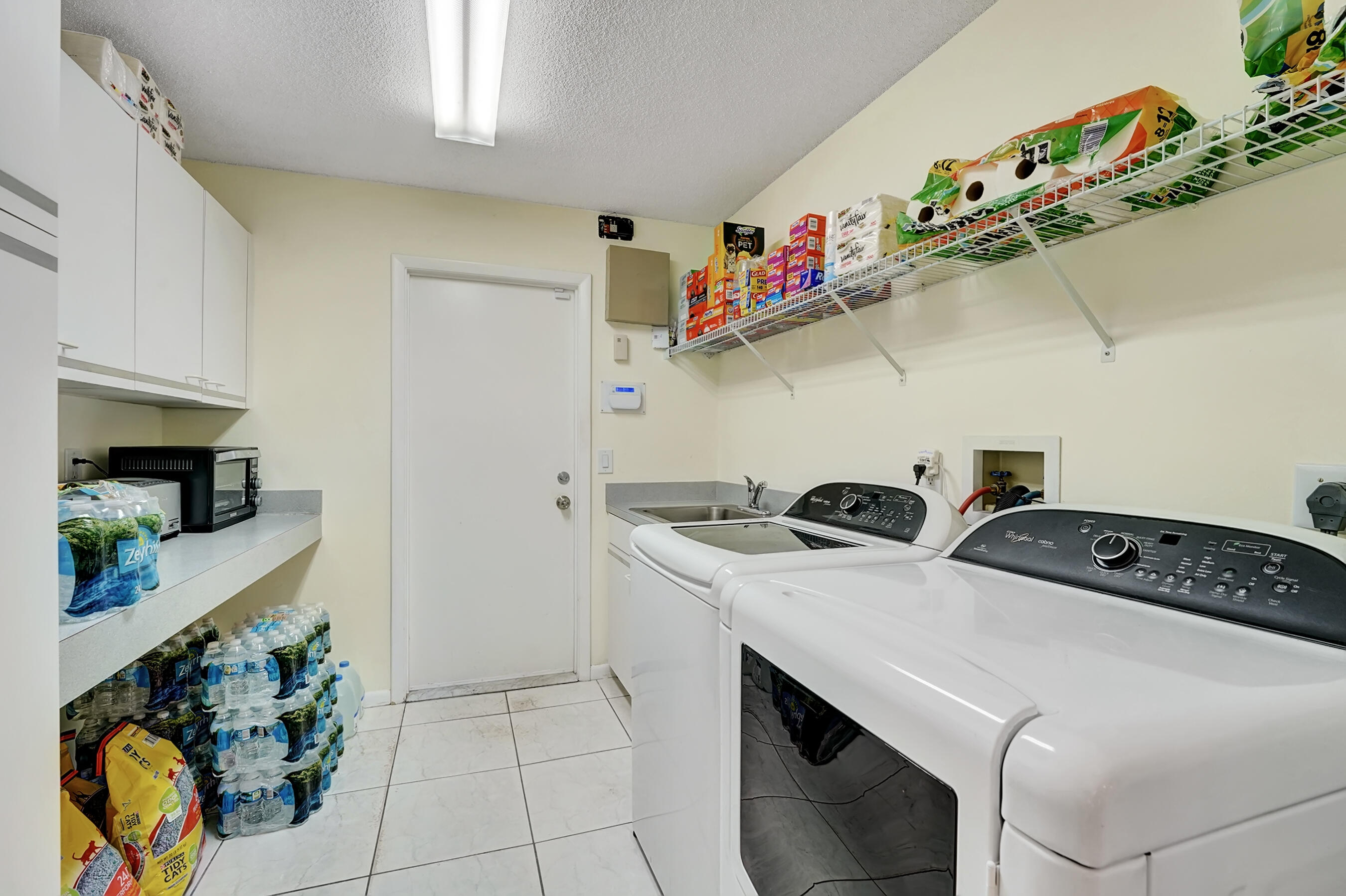 2310 Rabbit Hollowe Circle Delray Beach, FL 33445 - Photo 25 of 47 Laudry room