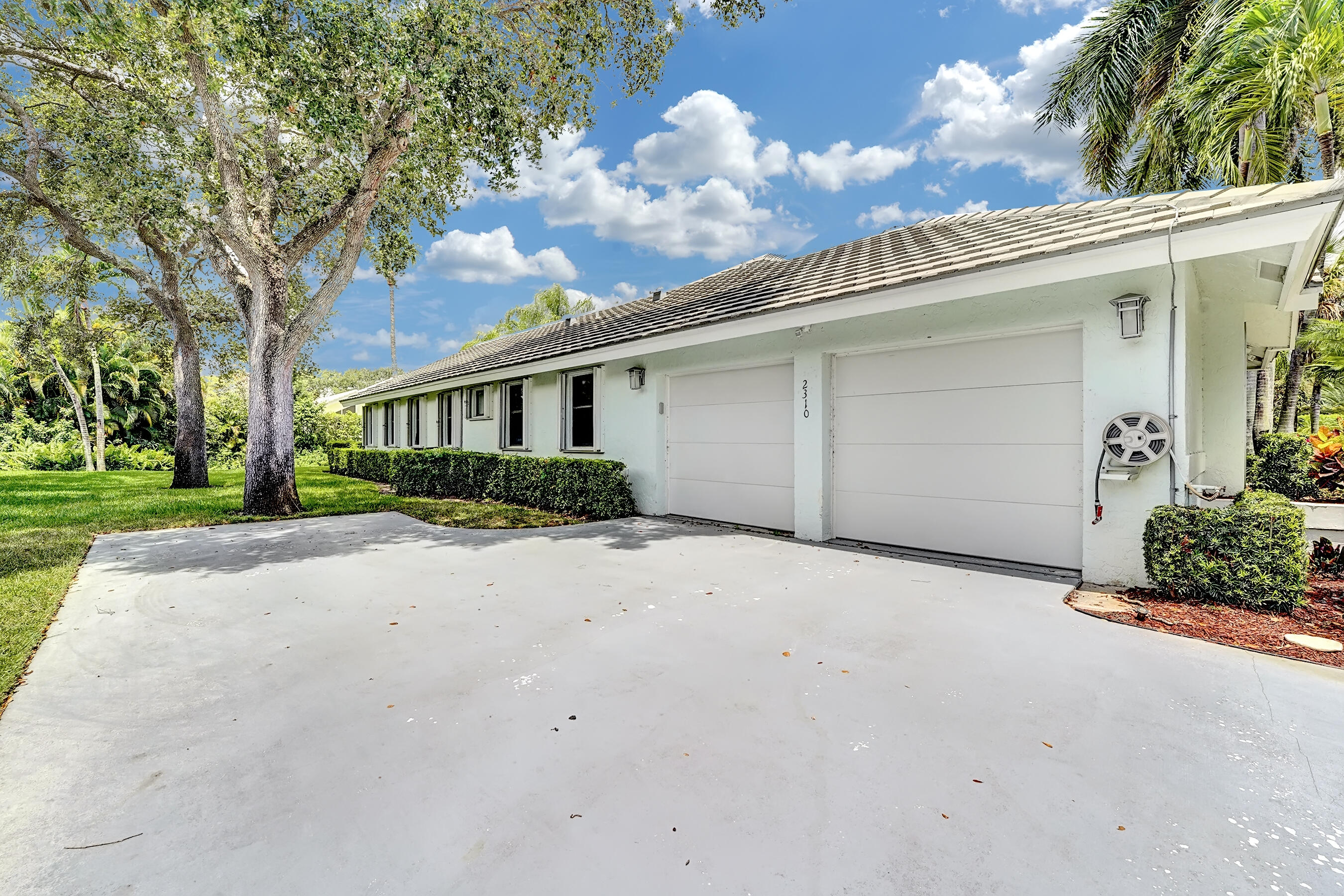 2310 Rabbit Hollowe Circle Delray Beach, FL 33445 - Photo 45 of 47 Garage
