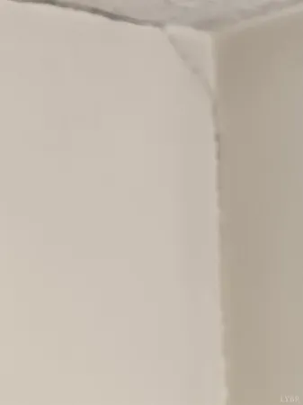 a wall with a white wall