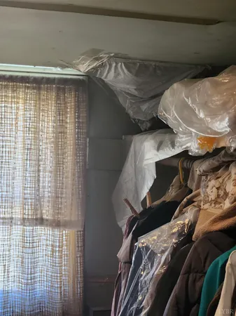 a bathroom with a toilet and a sink