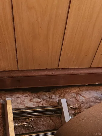 a view of kitchen and wooden floor