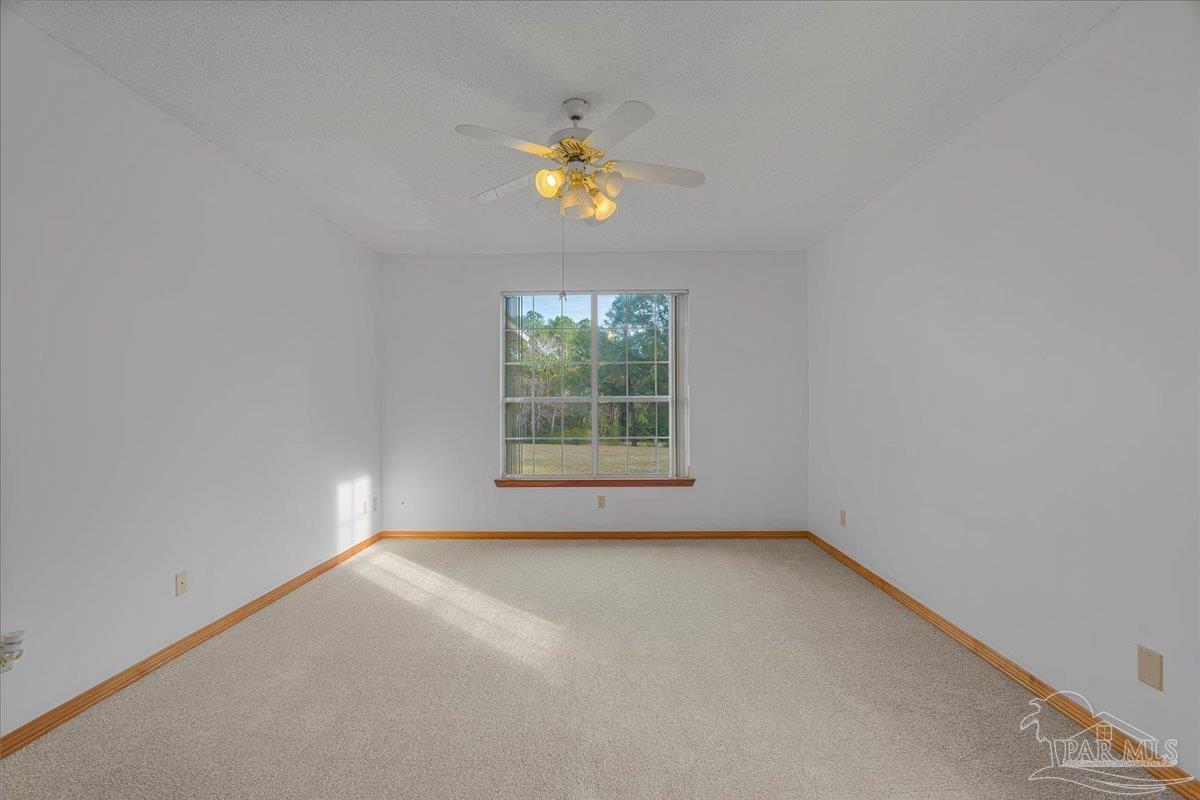6500 Winston Brown Road Milton, FL 32570 - Photo 25 of 43 a view of empty room with window